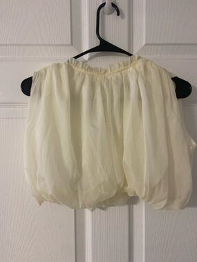 T12a- ECLIPSE Cream Ruffle Peplum Hem Crop Top